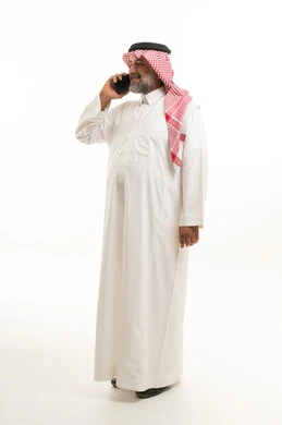 Saudi Man Talking on Smartphone Against White Background