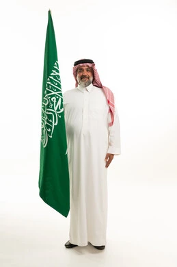 Saudi Man Holding Flag on White Background