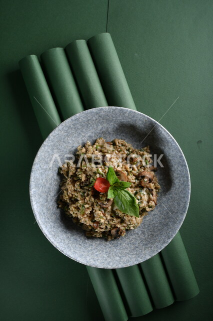 A plate of delicious rice and vegetables depicted on a green background, Arabic meals, delicious food recipes and dishes, Ramadan Iftar, Arabic food, Croma, delicious Ramadan dishes