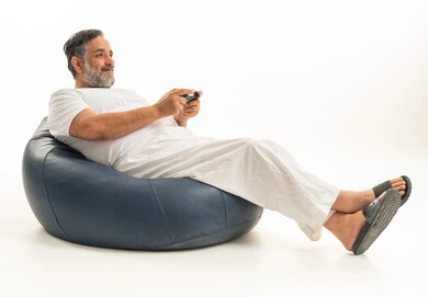 Saudi Man Playing Video Games on Beanbag