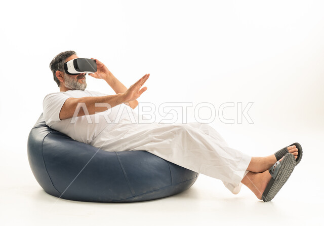 Saudi Man Using VR Headset on Beanbag