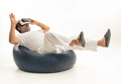 Arab Man in White Thobe Wearing VR Headset Studio