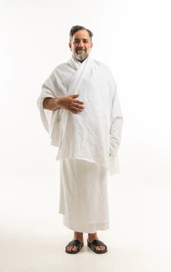 South Asian Muslim Man Wearing Ihram for Hajj or Umrah