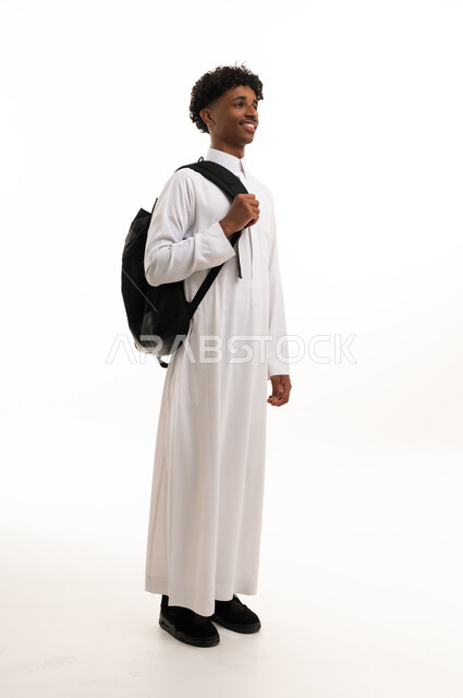Saudi Male Student in White Thobe with Backpack