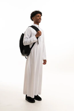Saudi Male Student in White Thobe with Backpack