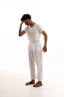 Saudi Man in White Undergarments Feeling Stressed