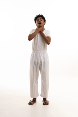 Saudi Man in White Undergarments with Choking Gesture