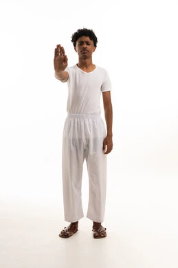 Saudi Man Making Stop Gesture on White Background