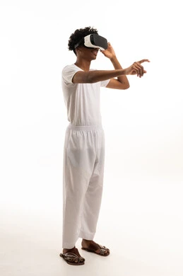 Saudi Man Wearing VR Headset in White Studio Background