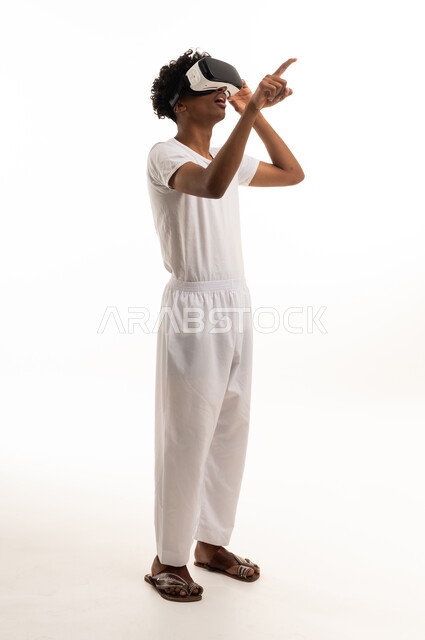 Saudi Man Using VR Headset on White Background