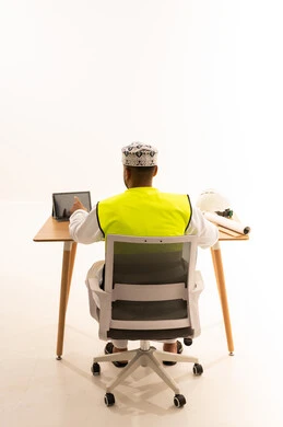 Omani Engineer with Tablet and Safety Gear