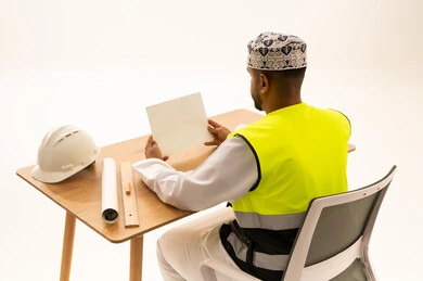 Omani Engineer with Hard Hat and Safety Vest