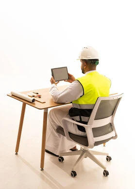 Saudi Engineer Using Tablet in Studio