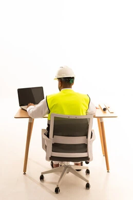 Saudi Engineer in White Thobe Using Laptop Back View