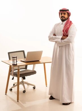 Saudi Businessman at Office Desk with Laptop