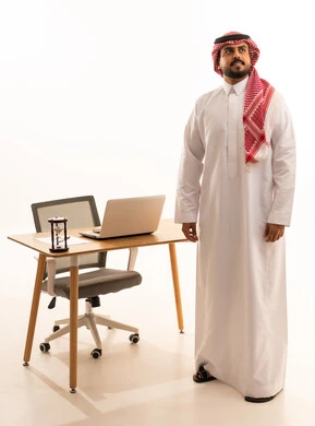 Saudi Businessman in Traditional Dress in Studio Office