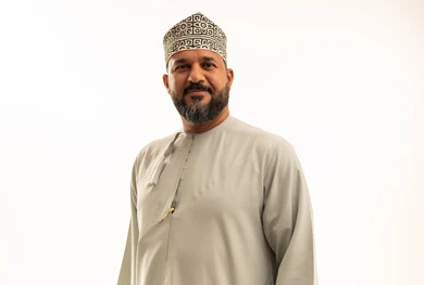Omani Man in Traditional Dishdasha and Kummah Portrait