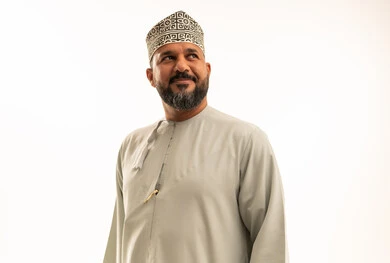 Omani Man in Traditional Kumma and Dishdasha Portrait