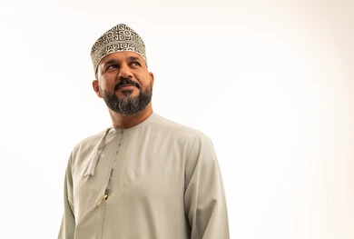 Omani Man in Traditional Dishdasha and Kummah Portrait