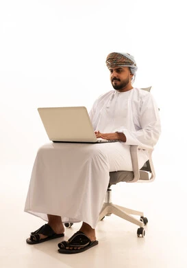 Omani Man with Laptop on White Background