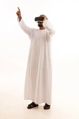 Omani Man in Traditional Dress Using VR Headset