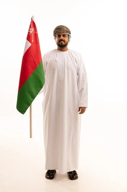 Omani Man Holding National Flag on White Background