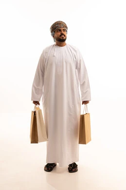 Omani Man with Shopping Bags on White Background