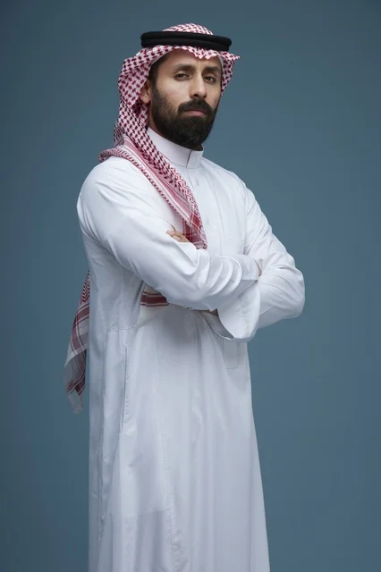 Saudi Man in Traditional Attire Studio Portrait Pose