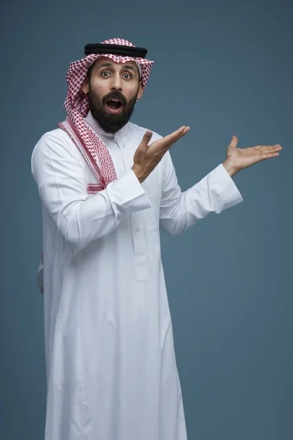Shocked Saudi Man Gesturing in Traditional Dress Studio