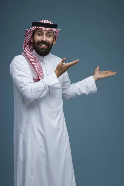 Saudi Man in Traditional Dress Gesturing in Studio