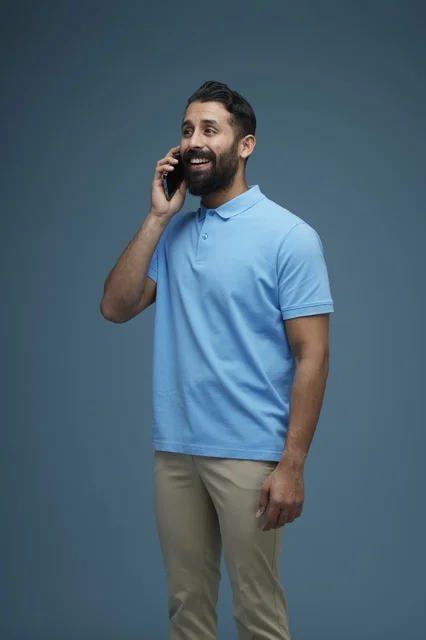 Saudi Man Talking on Smartphone in Casual Wear