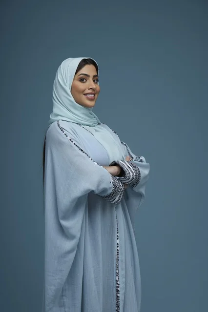 Saudi Woman in Blue Abaya Studio Portrait