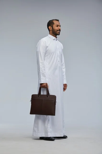 Saudi Businessman with Briefcase in Traditional Thobe