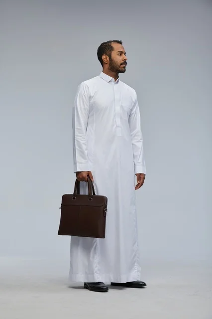 Saudi Businessman with Briefcase in Traditional Thobe