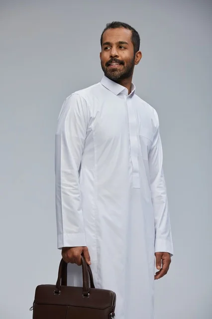 Saudi Businessman with Briefcase in Traditional Thobe