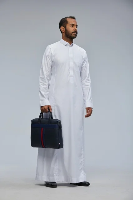 Saudi Businessman in White Thobe Holding Briefcase