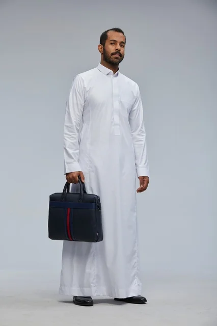 Saudi Businessman in White Thobe Holding Briefcase