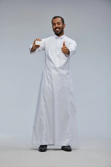 Saudi Man in Thobe Holding Blank Card Thumbs Up