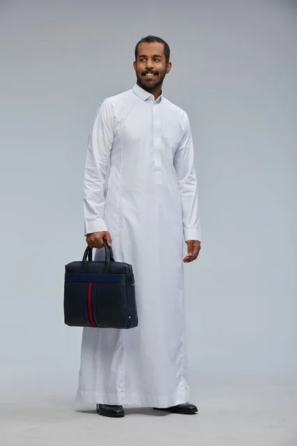 Saudi Businessman in Traditional Thobe with Briefcase