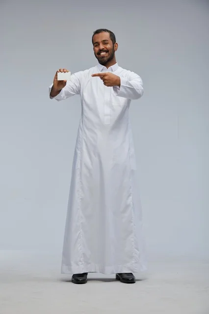 Smiling Saudi Man Holding Blank Business Card