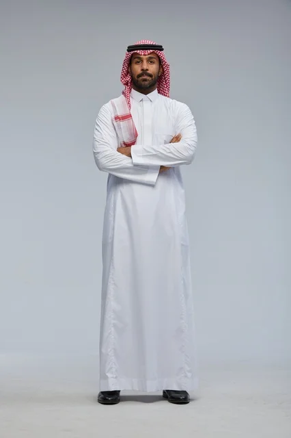 Saudi Man in Traditional Dress with Arms Crossed
