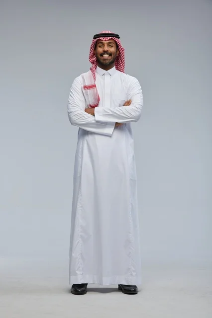 Smiling Saudi Man in Traditional Dress Full Portrait