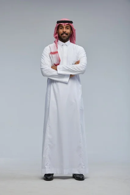 Saudi Man in Traditional Attire Arms Crossed