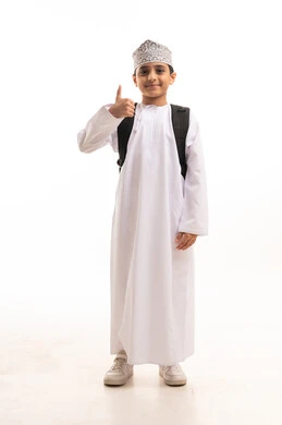 Omani Boy in Traditional Dress with Backpack