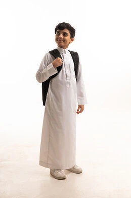 Saudi Student in White Thobe with School Backpack