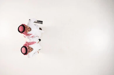 Saudi Businessmen in Traditional Thobe Top View