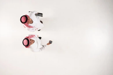Saudi Businessmen Overhead View on White Background