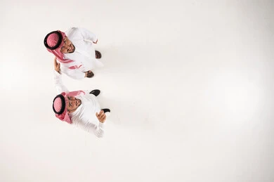 Two Saudi Men in Traditional Clothing Top Down View