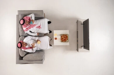 Saudi Men Watching TV from an Overhead Perspective