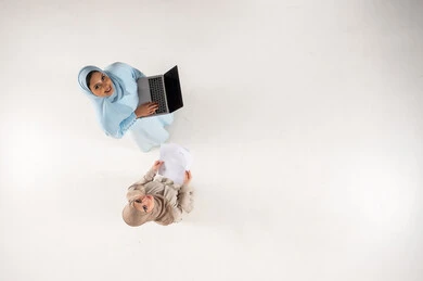 Saudi Businesswomen with Laptop Aerial View